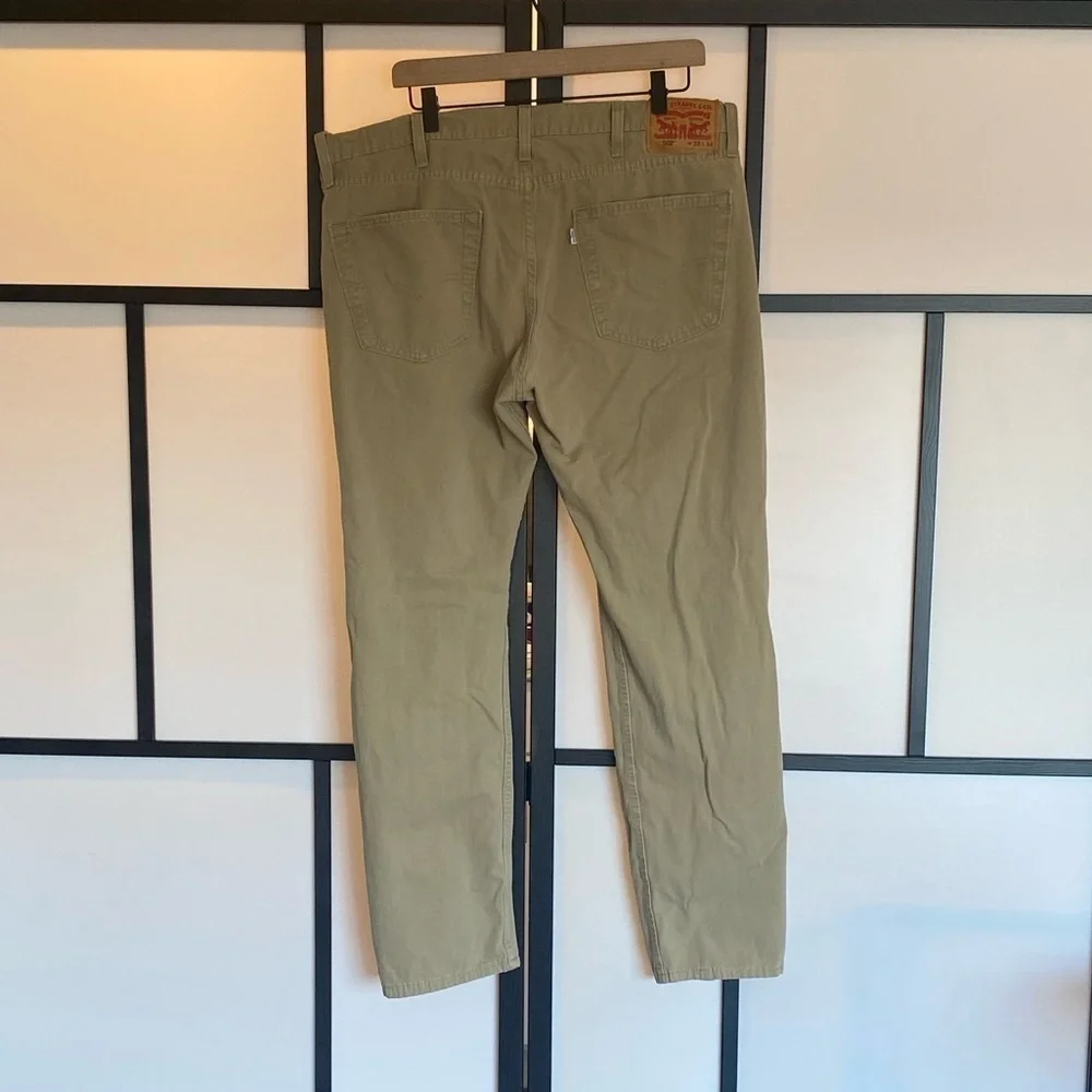 Levi's 502 tan pants. Size 36. HEMMED‎